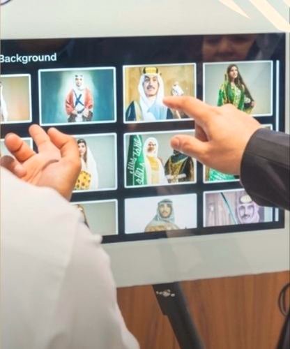 Guest choosing an AI background on the booth screen